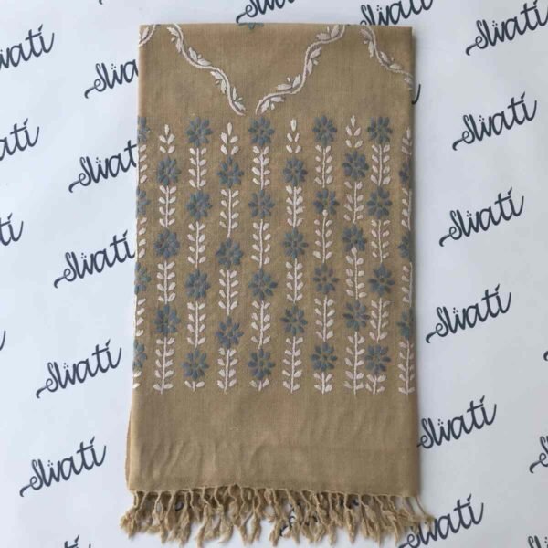 Women's wool shawl with intricate hand embroidery, featuring a warm biscuit color, perfect for winter styling