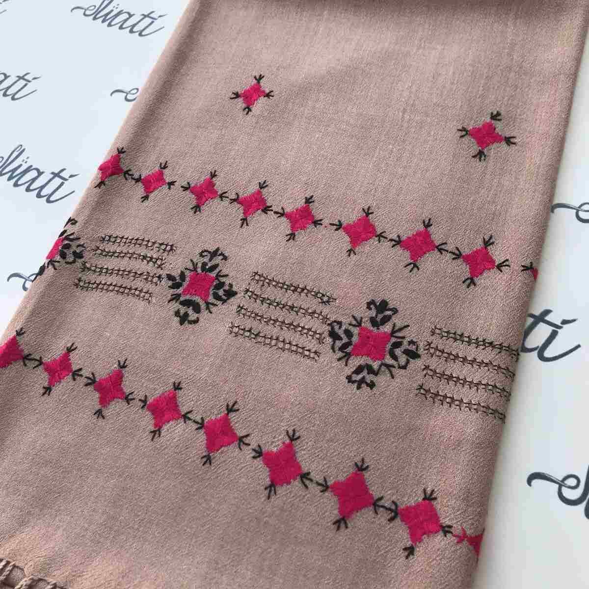 Elegant ladies wool shawl with intricate pink and black hand embroidery, offering warmth and style for the winter season.