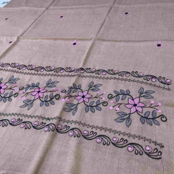 Wrap yourself in warmth and elegance with our Pure Wool Shawl for Ladies, featuring exquisite brown hand embroidery by skilled artisans.